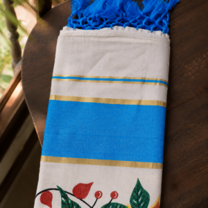 Krishna peacock printed Kerala saree with sky blue border